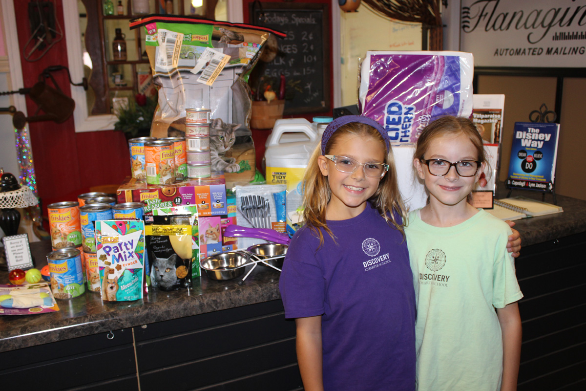 Girls Use Ninth Birthdays as Occasion to Raise Supplies for Animal Shelter