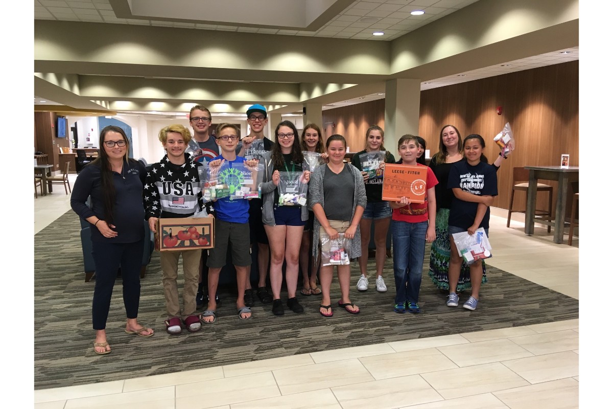Queen of All Saints Catholic Church Teens Donate Blessing Bags to Homeless